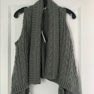 Sleeveless asymmetrical cardigan